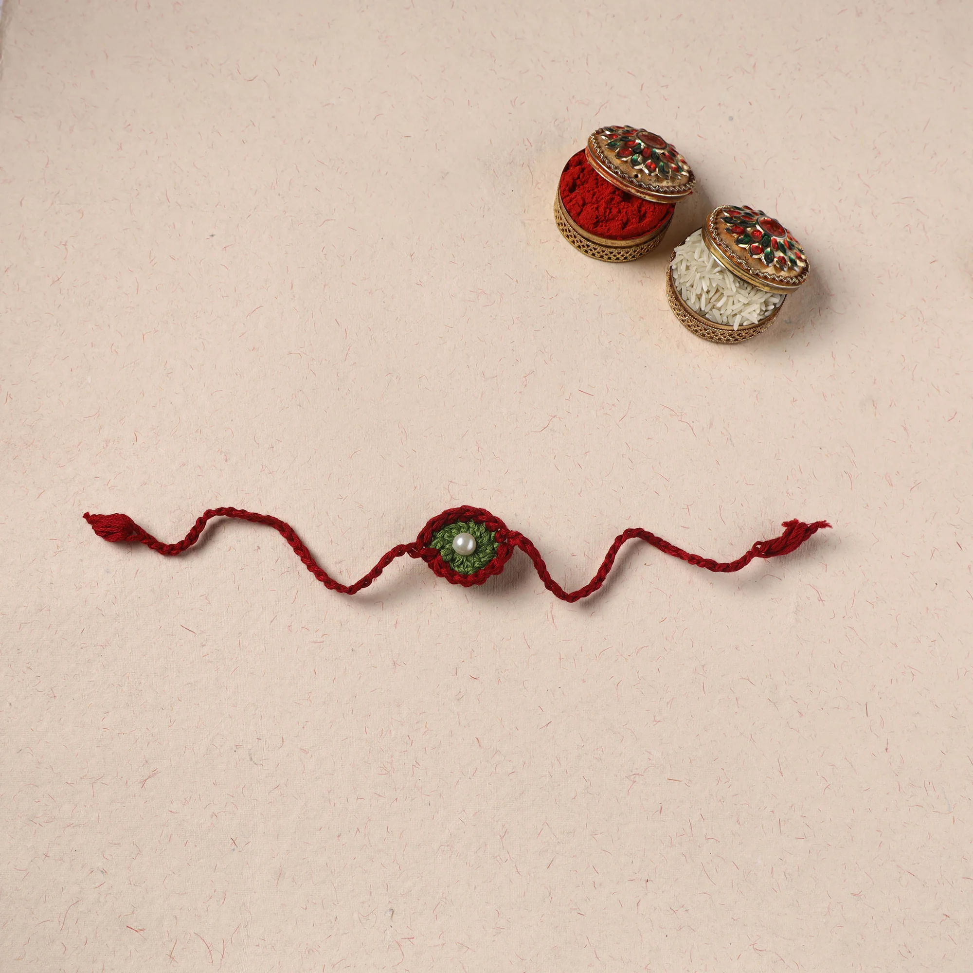 Handmade Crochet Pearl Work Rakhi 05