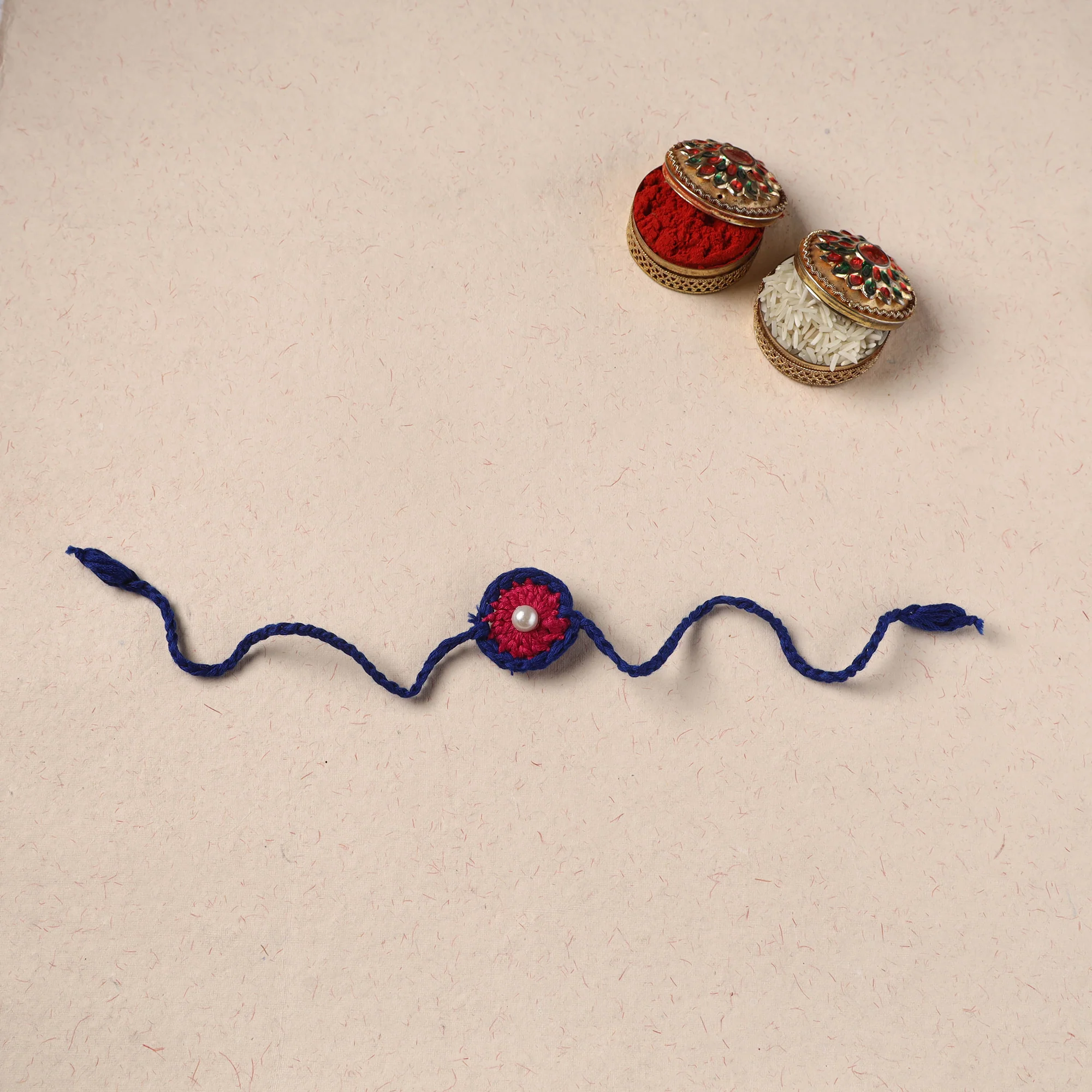 Handmade Crochet Pearl Work Rakhi 06