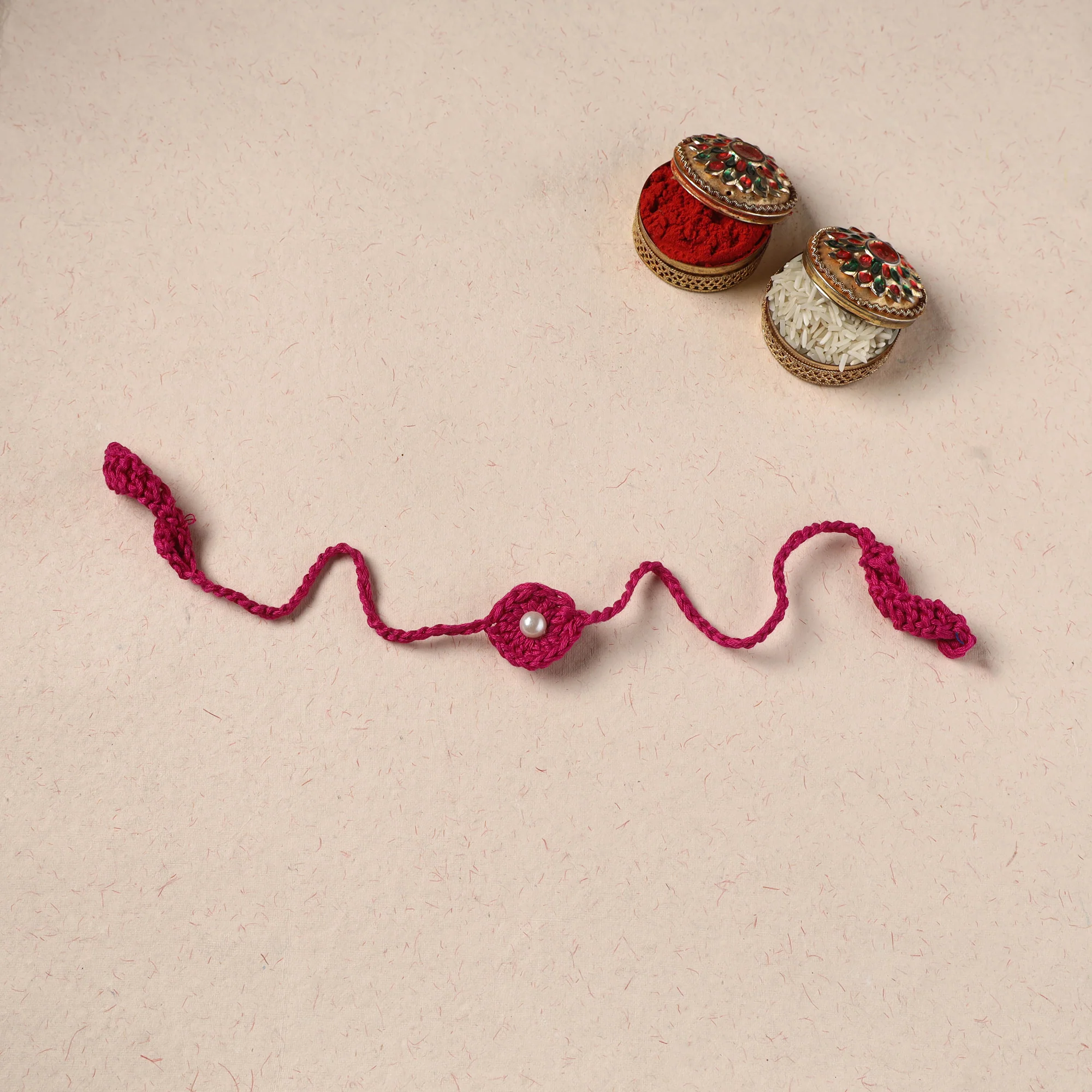 Handmade Crochet Pearl Work Rakhi 08