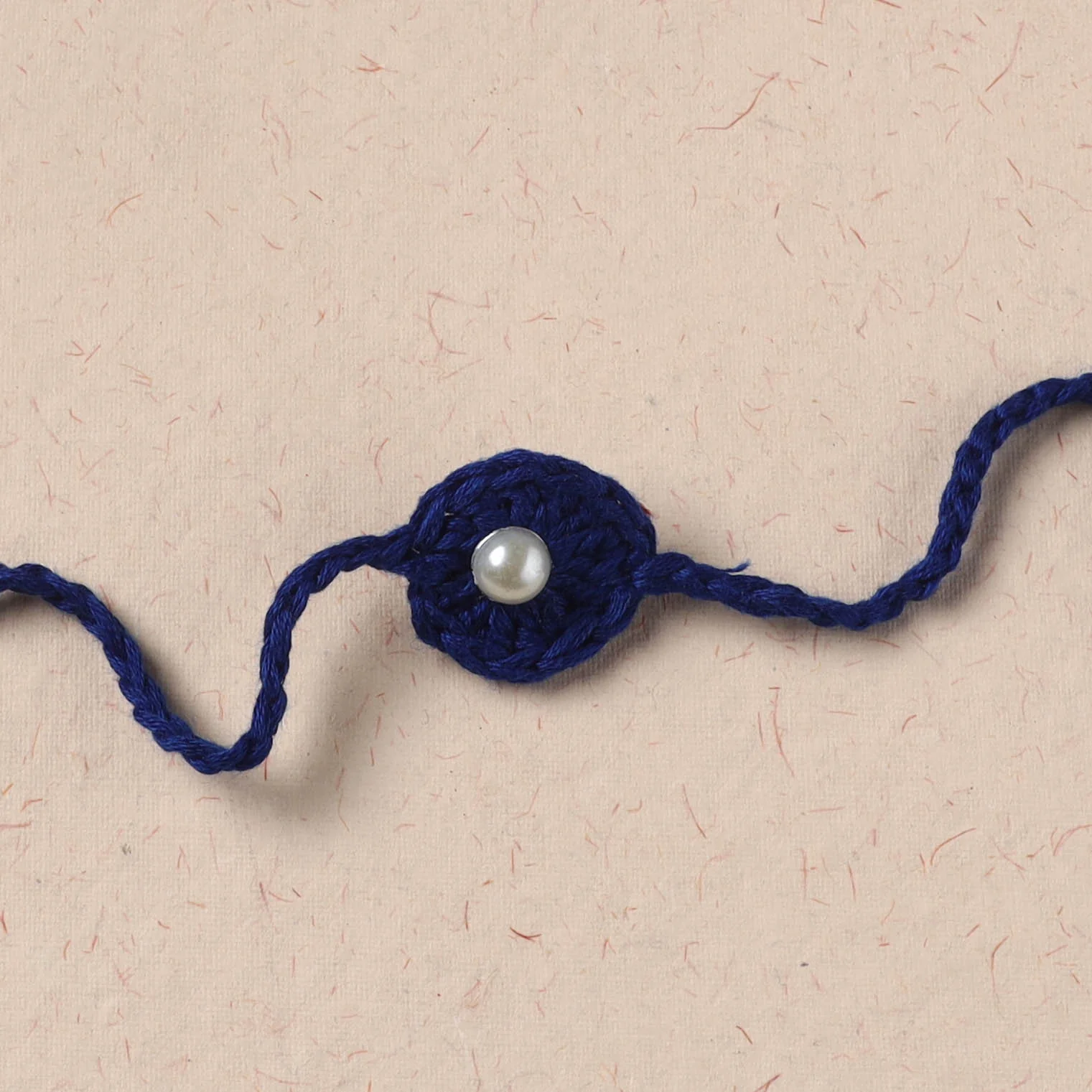 Handmade Crochet Pearl Work Rakhi 13 - Image 2