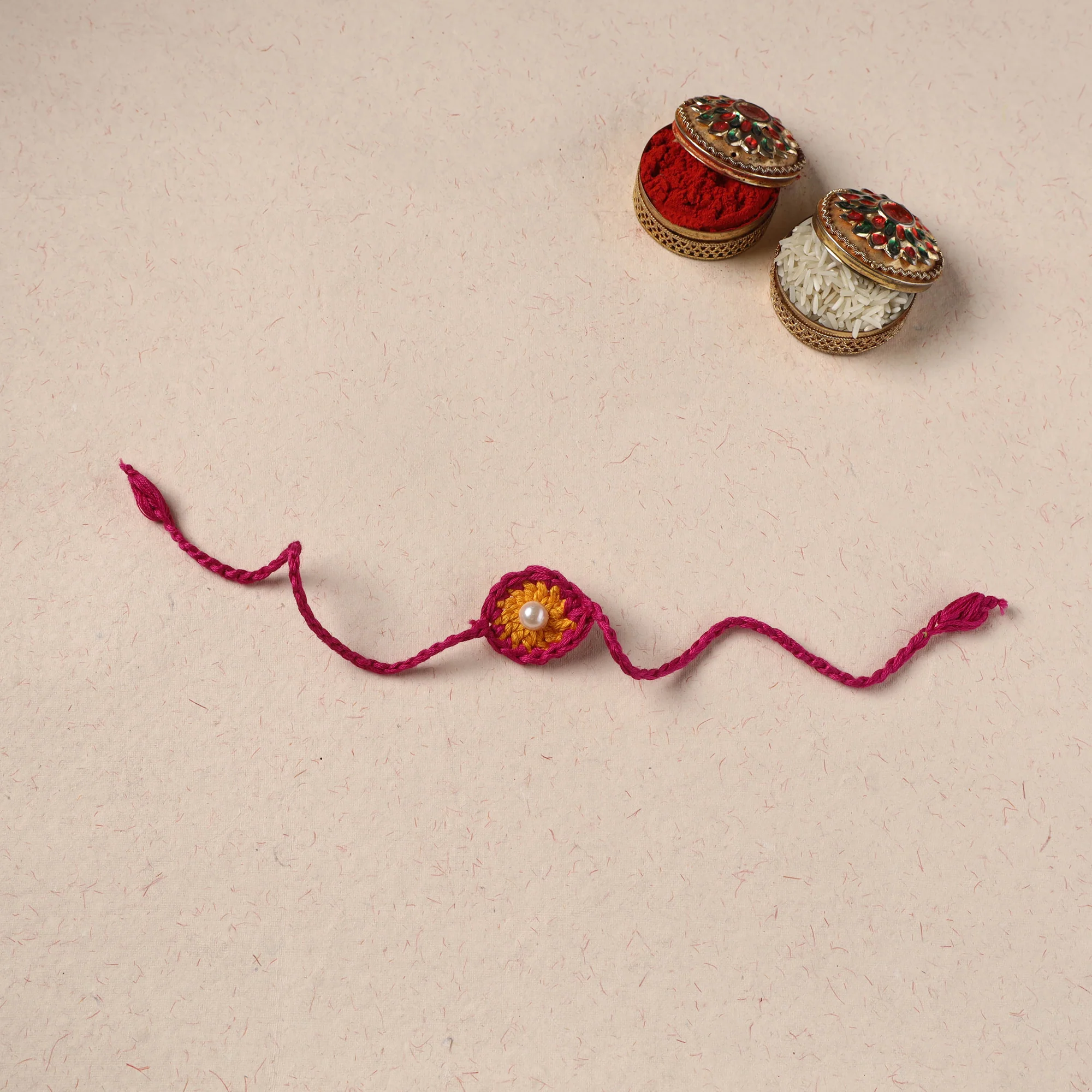 Handmade Crochet Pearl Work Rakhi 15