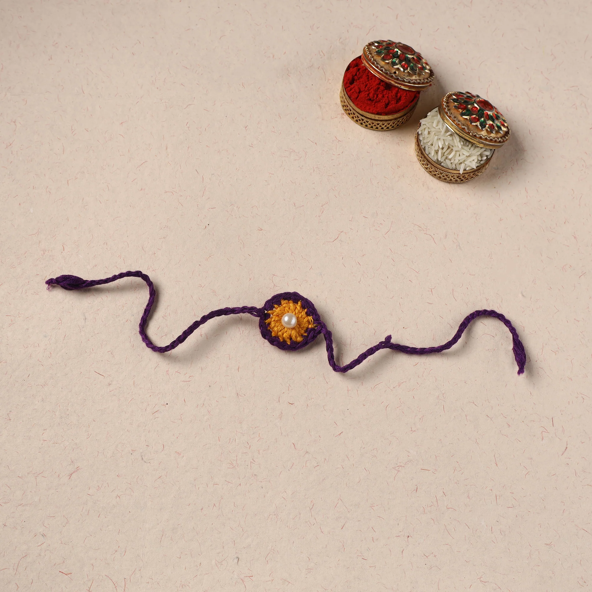 Handmade Crochet Pearl Work Rakhi 18